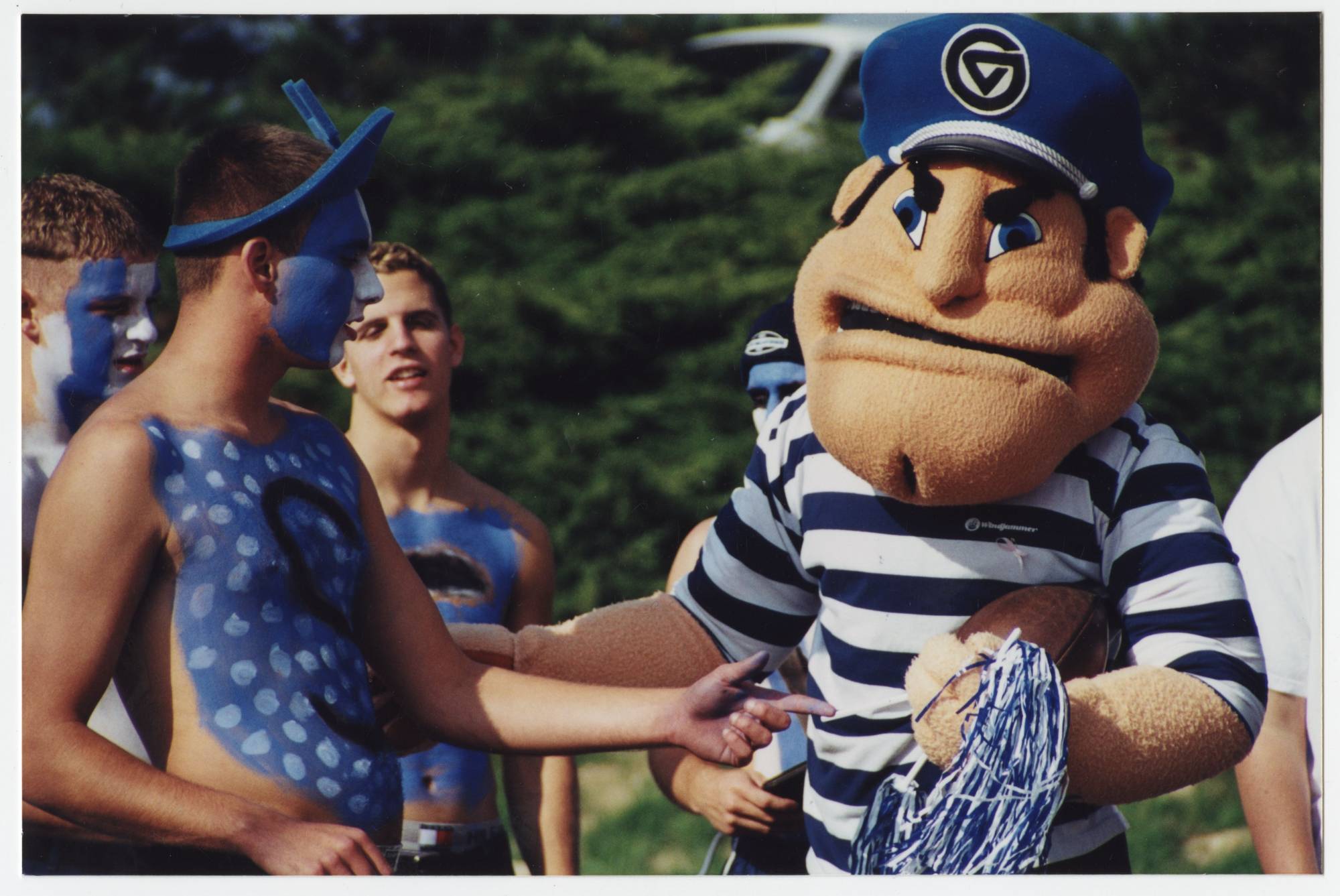 Louie from the 90s with students